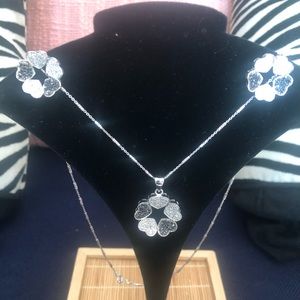 9.25 sterling silver necklace with earrings.